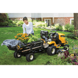 alt tag: Cub Cadet Collapsible Trailer With Tools Outdoors